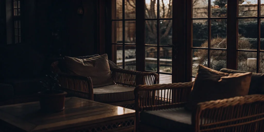 Bright sunroom addition with garden view.
